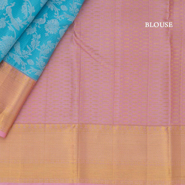 Blue Floral Brocade Silk Saree With Pink Zari Border - Kumaran Silks