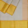 Biscuit Colour Silk Dhoti With Mayil Kannu Yellow Border - Kumaran Silks