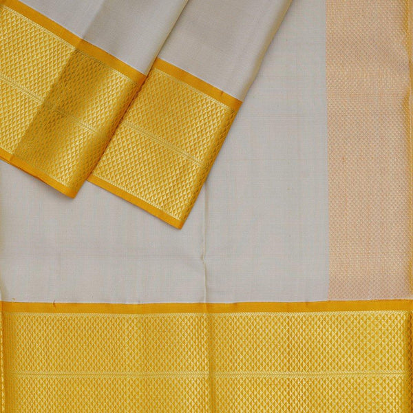 Biscuit Colour Silk Dhoti With Mayil Kannu Yellow Border - Kumaran Silks