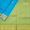 Amirthavarshni Sky Blue Silk Cotton Saree With Green Border - Kumaran Silks