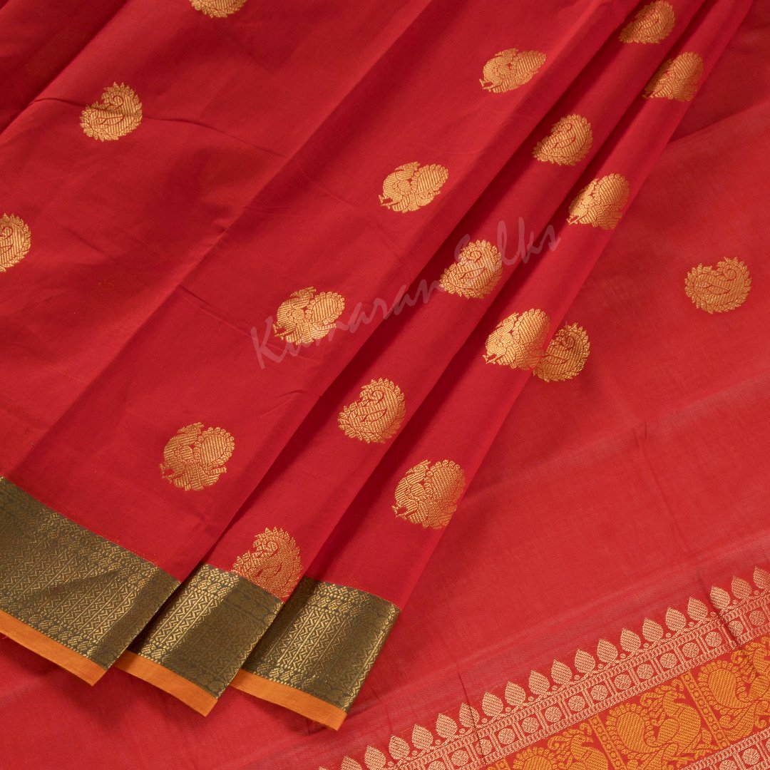 Kanchi Cotton Red Saree With Peacock And Mango Buttas On The Body And Zig Zag Green Border