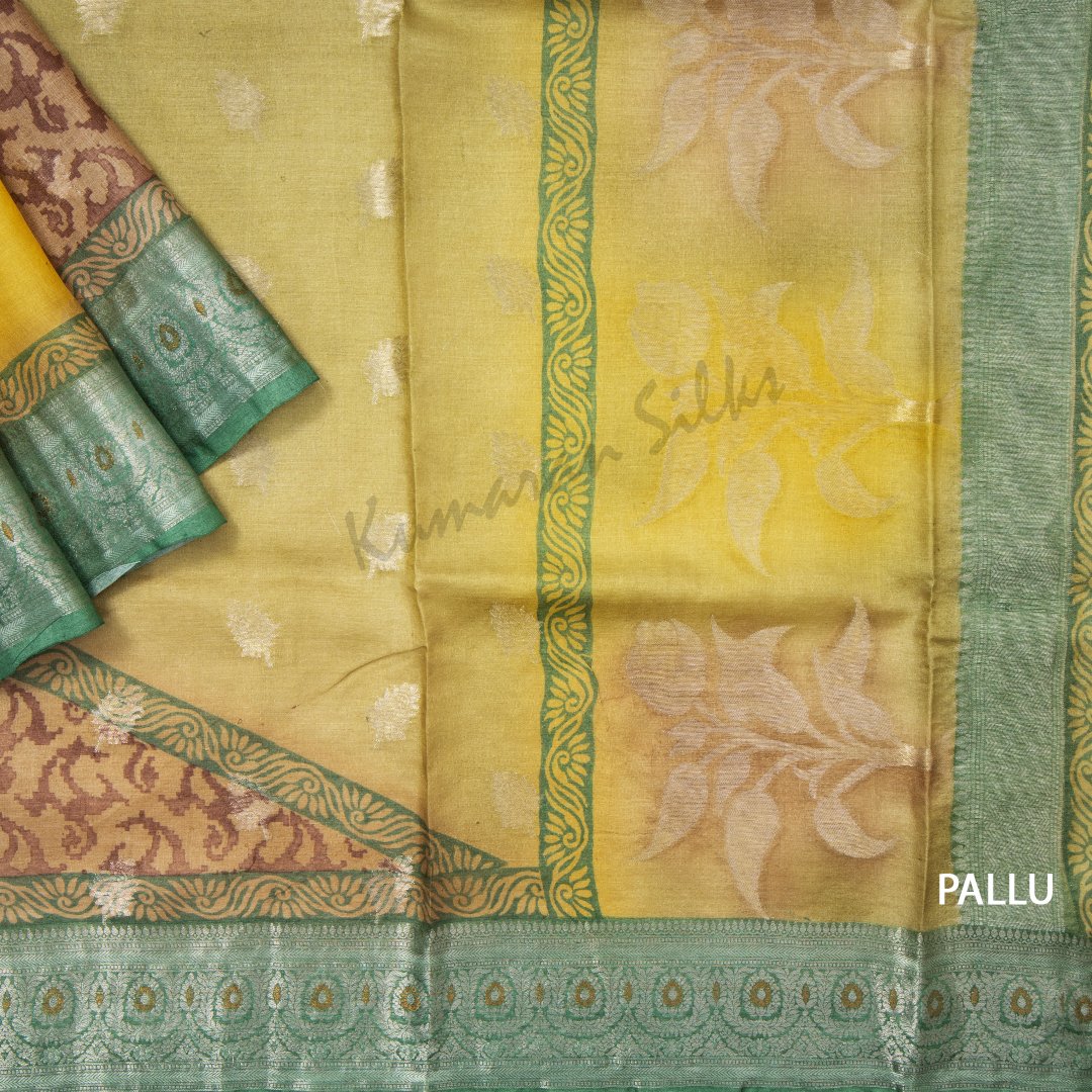 Tussar Multi Colour Printed Saree With Leaf Designs On The Body And Contrast Border