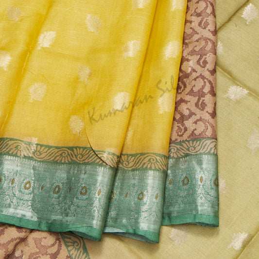 Tussar Multi Colour Printed Saree With Leaf Designs On The Body And Contrast Border