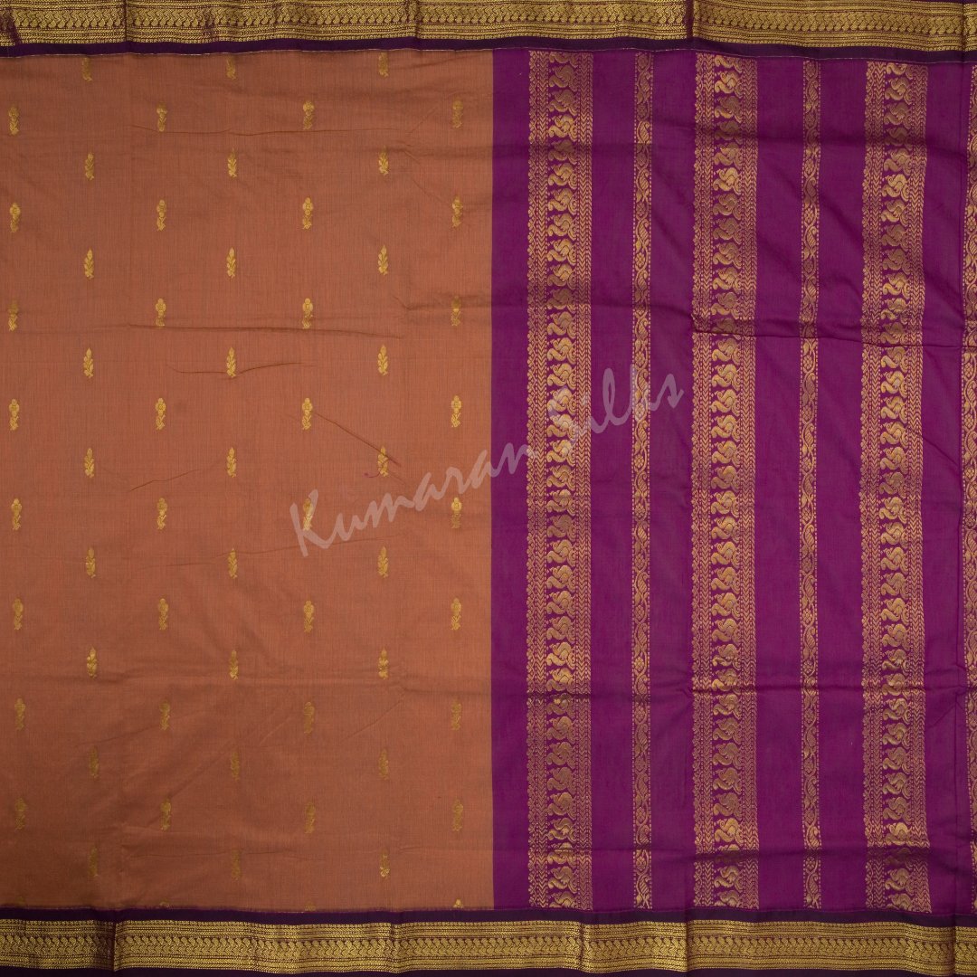 Kalyani Cotton Cinnamon Brown Saree With Small Buttas On The Body And Peacock Motif On The Pallu