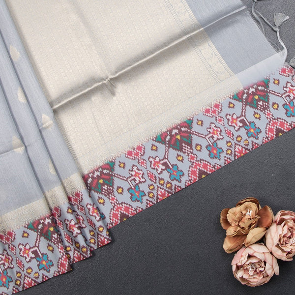 Raw Silk Grey Saree With Zari Buttas On The Body