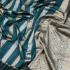 Raw Silk Teal Green Saree With Zari Stripes Design And Simple Border