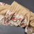 Semi Raw Silk Golden Brown Saree With Zari Buttas And Printed Border
