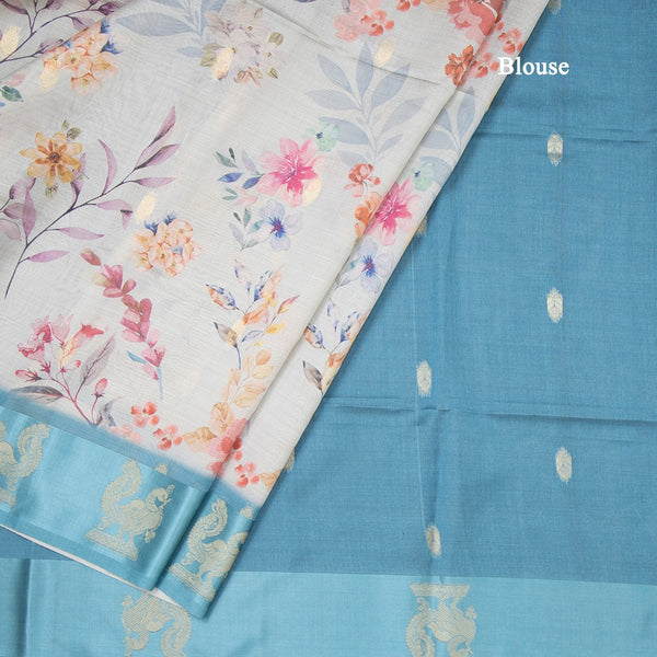 Raw Silk Light Blue Floral Printed Saree With Zari Border