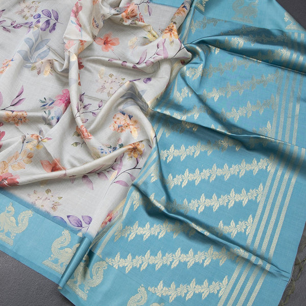 Raw Silk Light Blue Floral Printed Saree With Zari Border
