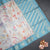 Raw Silk Light Blue Floral Printed Saree With Zari Border