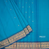 Kanchi Cotton Peacock Blue Saree With Zari Buttas And Zari Border