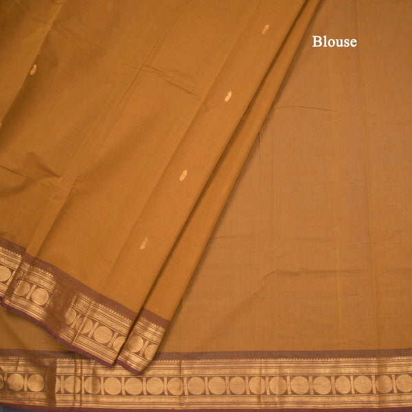 Kanchi Cotton Golden Brown Saree With Zari Buttas And Zari Border