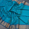 Kanchi Cotton Peacock Blue Saree With Zari Buttas And Zari Border 02 - Kumaran Silks