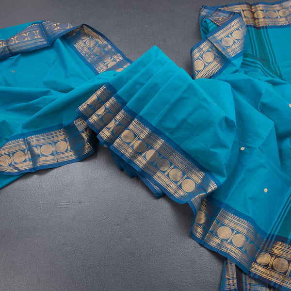 Kanchi Cotton Peacock Blue Saree With Zari Buttas And Zari Border 02