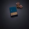 Kanchi Cotton Peacock Blue Saree With Zari Buttas And Rettapet Border