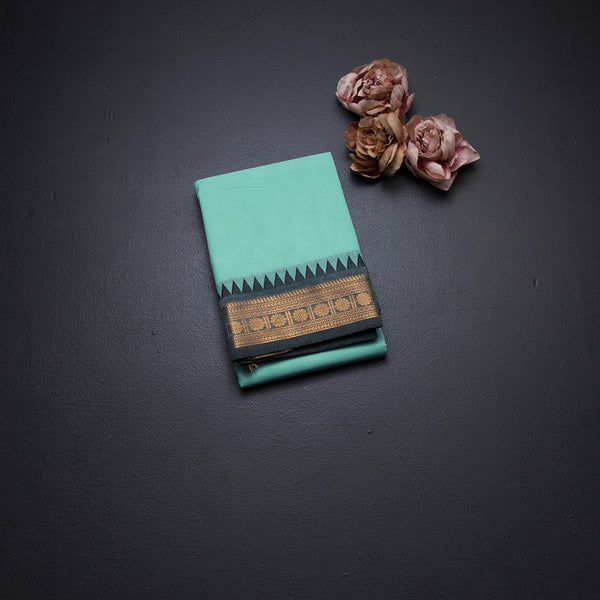 Kanchi Cotton Mint Green Plain Saree And Temple Border