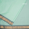Kanchi Cotton Mint Green Plain Saree And Temple Border