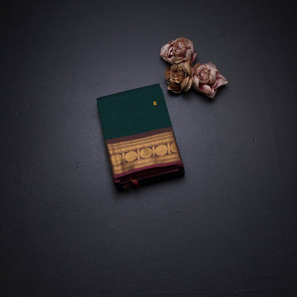 Kanchi Cotton Dark GreenSaree With Thread Buttas And Zari Border 02