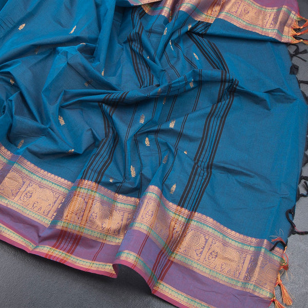 Kanchi Cotton Peacock Blue Saree With Zari Buttas And Zari Border 03 - Kumaran Silks