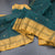 Kanchi Cotton Dark Green Saree With Zari Buttas And Zari Border