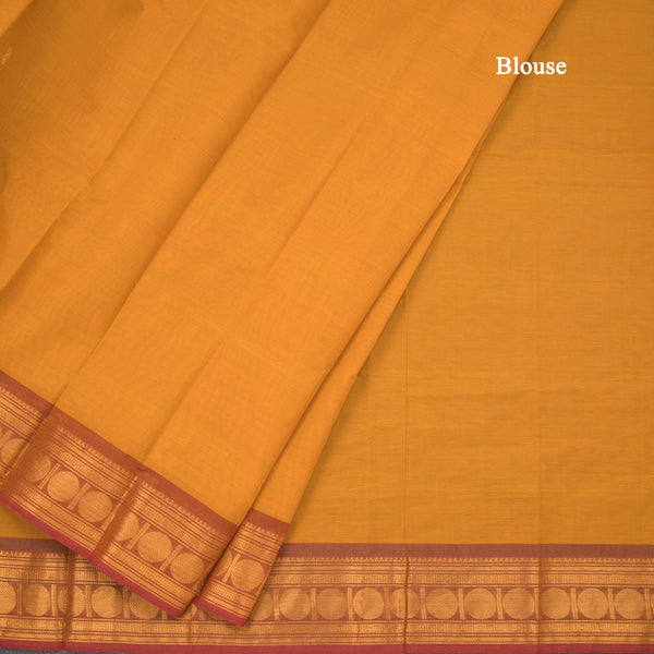 Kanchi Cotton Mustard Saree With Zari Buttas And Zari Border