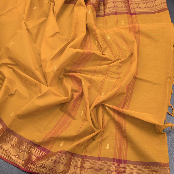 Kanchi Cotton Mustard Saree With Zari Buttas And Zari Border - Kumaran Silks