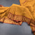 Kanchi Cotton Mustard Saree With Zari Buttas And Zari Border