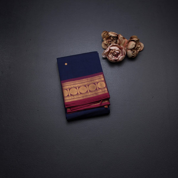 Kanchi Cotton Navy Blue Saree With Zari Buttas And Zari Border