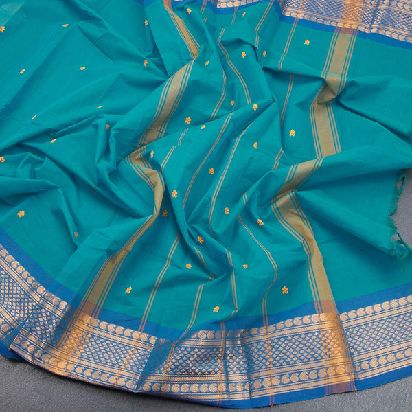 Kanchi Cotton Peacock Blue Saree With Thread Buttas And Zari Border 02 - Kumaran Silks