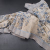 Semi Linen Cream Floral Printed Saree With Zari Border