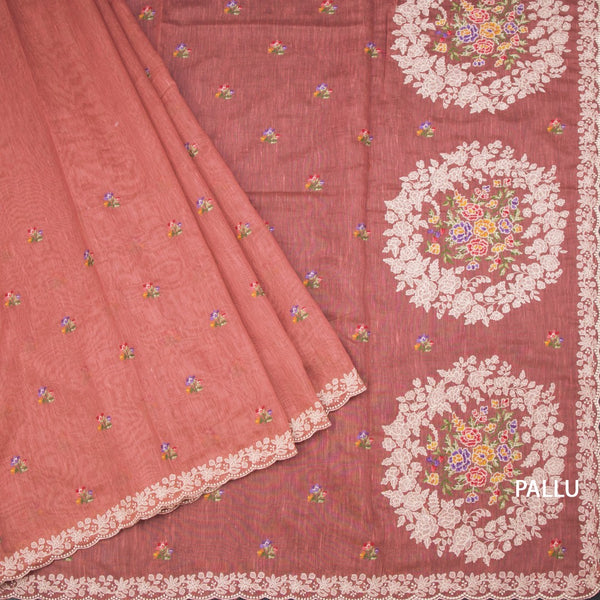 Linen Peach Saree With Floral Thread Buttas And Thread Border