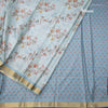 Raw Silk Sky Blue Zari Checked With floral Printed Saree And Zari Border