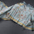 Raw Silk Sky Blue Zari Checked With floral Printed Saree And Zari Border