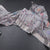 Raw Silk Light Grey Floral Printed Saree And Zari Border