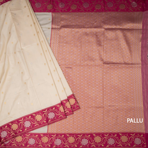 Art Silk Cream Saree With Zari Buttas And Floral Border