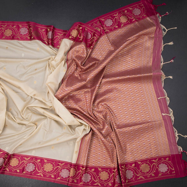Art Silk Cream Saree With Zari Buttas And Floral Border
