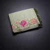 KSRTSR42287-1-Raw-Silk-Pista-Green-Saree-With-Zari-Stripes-And-Floral-Thread-Border-03-fold