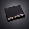 KSRTSR42333-1-Raw-Silk-Black-Saree-With-Zari-buttas-And-Thread-Border-02-fold