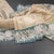 KSRTSR42362-Tissue-Cream-Zari-Stripes-Saree-And-Floral-Border-03-main