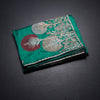 KSRTSR42375-1-Raw-Silk-Peacock-Green-Zari-Worked-Saree-In-Tree-Design-fold