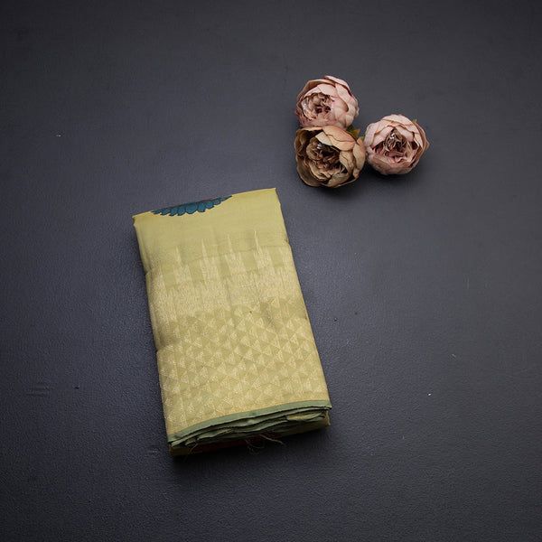 Kalamkari Pista Green Hand Painted Silk Saree In Peacock Design And Temple Zari Border