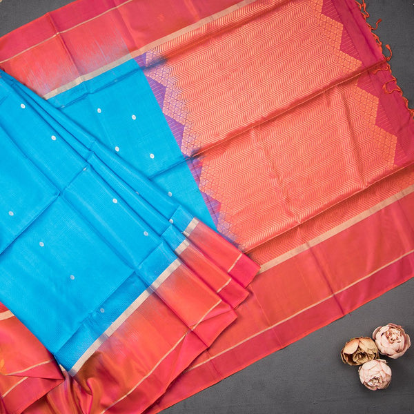 Blue Soft Silk Saree With Coin Zari Buttis And Copper Zari Worked Pink Zig Zag Pallu