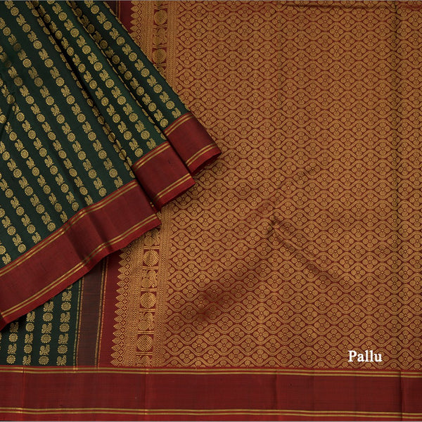 Bottle Green Kanchipuram Silk Saree With Vertically Running Chakra And Peacock Designs