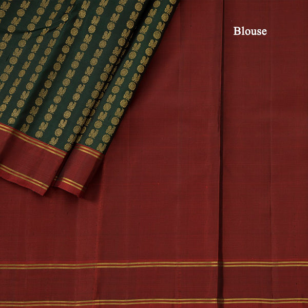 Bottle Green Kanchipuram Silk Saree With Vertically Running Chakra And Peacock Designs