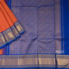 Plain Orange Kanchipuram Silk Saree With Contrasting Blue Border