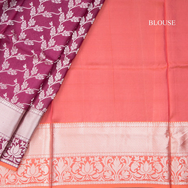 Wine Shaded Soft Silk Saree With Floral Pattern On The Body