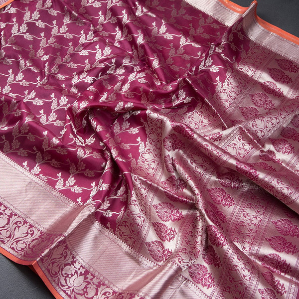 Wine Shaded Soft Silk Saree With Floral Pattern On The Body