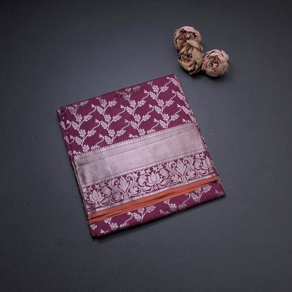 Wine Shaded Soft Silk Saree With Floral Pattern On The Body