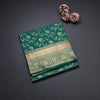 Dark Green Soft Silk Saree With Floral Pattern On The Body