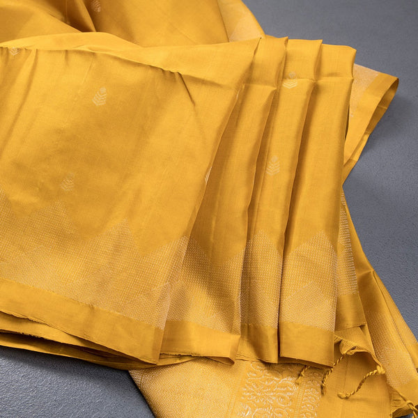Mustard Soft Silk Saree With Tiny Buttis On Body And Stylish Border